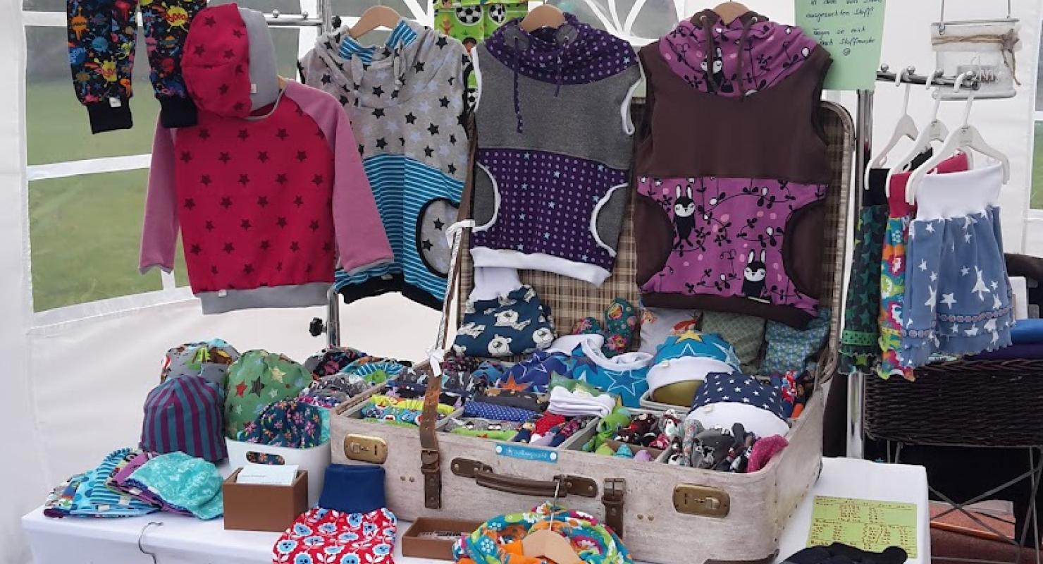 Nulis-Chinderchleider - Second-Hand-Kleidung in Bern